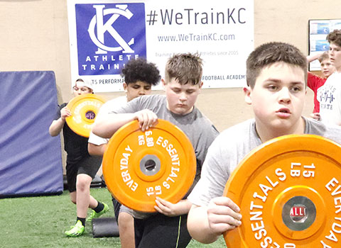 Kansas City Athlete Training Defensive Line Training Football Academy Group Classes and Private 1 on 1 Lessons for youth, middle school and high school football players looking to improve and excel at any defensive line position including rush defensive end with fundamentals being taught at the WeTrainKC Indoor Facility in Kansas City Missouri