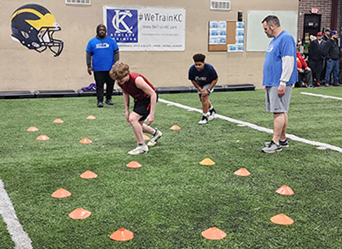Kansas City Athlete Training Defensive Line Training Football Academy Group Classes and Private 1 on 1 Lessons for youth, middle school and high school football players looking to improve and excel at any defensive line position including rush defensive end with fundamentals being taught at the WeTrainKC Indoor Facility in Kansas City Missouri