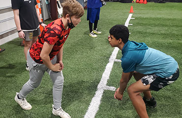 Defensive Backs such as Corners and Safeties Training via Group Classes in Kansas City Missouri at Kansas City Athlete Training Football Academy offering Athletic Sports Perforance Training for both youth and high school athletes.