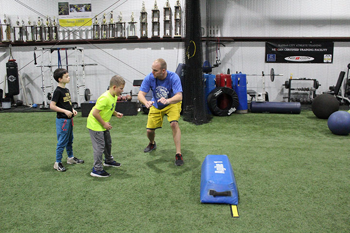 Defensive Line Football Training by Kansas City Athlete Training for both youth and high school athletes with group classes and private training along with camps and speed and agility classes for all sports and athletics in Kansas City Missouri