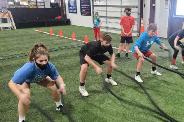 Weightlifting by Kansas City Athlete Training Sports Performance Speed and Agility Training for youth, middle school and high school athletes with group classes and private training along with football academy training in Kansas City Missouri