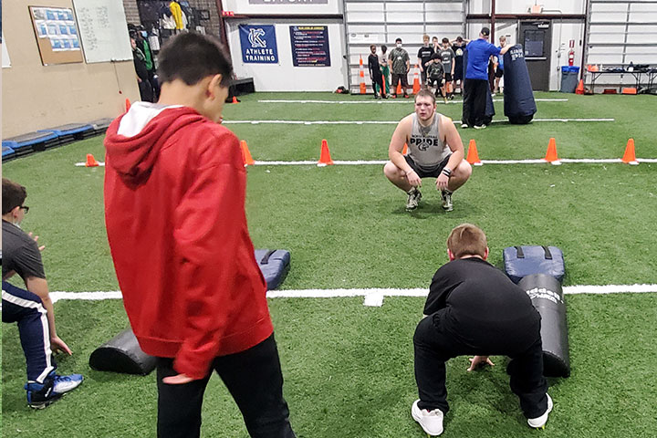 Offensive Line Football Training by Kansas City Athlete Training for both youth and high school athletes with group classes and private training along with camps and speed and agility classes for all sports and athletics in Kansas City Missouri