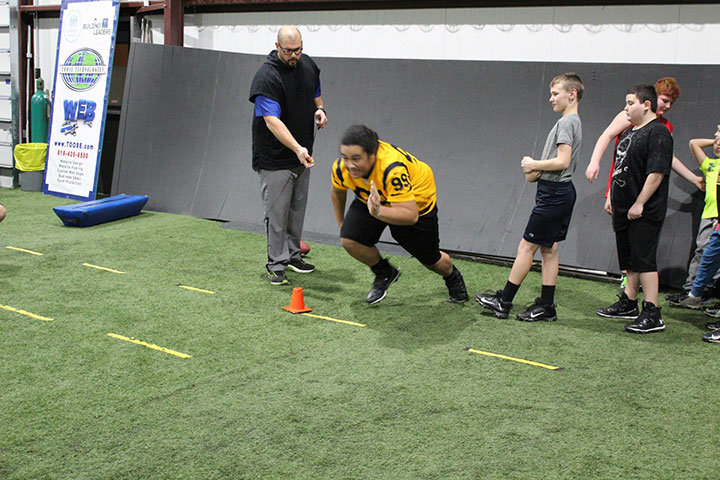 Defensive Line Football Training by Kansas City Athlete Training for both youth and high school athletes with group classes and private training along with camps and speed and agility classes for all sports and athletics in Kansas City Missouri