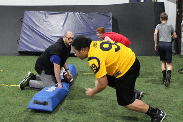 Defensive Line Football Training by Kansas City Athlete Training for both youth and high school athletes with group classes and private training along with camps and speed and agility classes for all sports and athletics in Kansas City Missouri