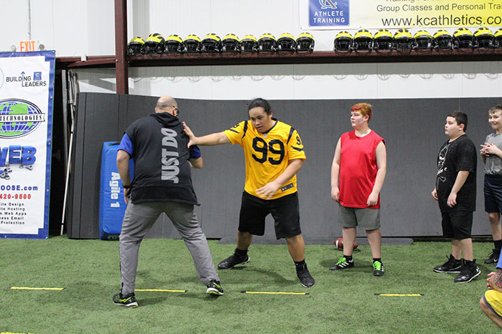 Defensive Line Football Training by Kansas City Athlete Training for both youth and high school athletes with group classes and private training along with camps and speed and agility classes for all sports and athletics in Kansas City Missouri