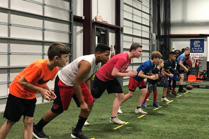 Wide Receiver Football Training by Kansas City Athlete Training for both youth and high school athletes with group classes and private training along with camps and speed and agility classes for all sports and athletics in Kansas City Missouri