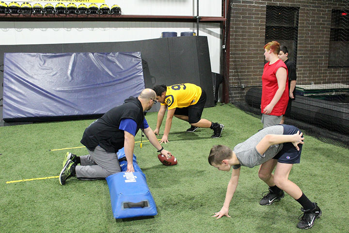 Defensive Line Football Training by Kansas City Athlete Training for both youth and high school athletes with group classes and private training along with camps and speed and agility classes for all sports and athletics in Kansas City Missouri