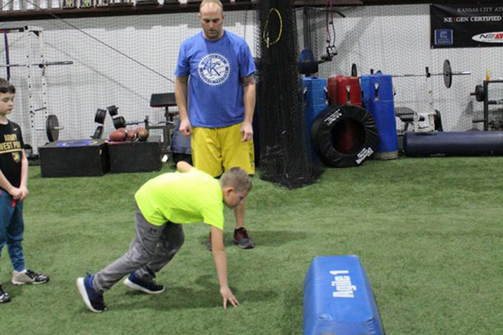 Defensive Line Football Training by Kansas City Athlete Training for both youth and high school athletes with group classes and private training along with camps and speed and agility classes for all sports and athletics in Kansas City Missouri