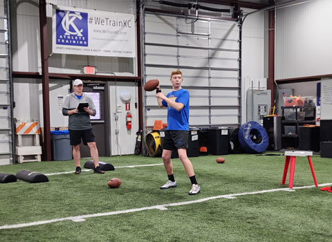 Kansas City Athlete Training Quarterback Football Academy Group Classes and Private QB 1 on 1 Lessons for youth, middle school and high school football players looking to improve and excel at the Quarterback position with fundamentals being taught at the WeTrainKC Indoor Facility in Kansas City Missouri